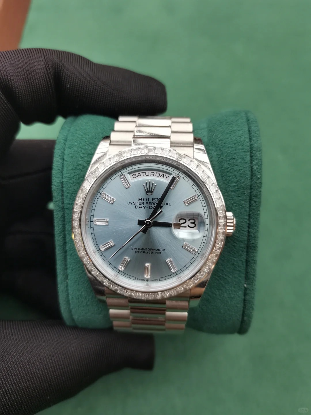 The Oyster Perpetual Day-Date 36 in platinum with an ice-blue dial, diamond-set bezel and President bracelet. -m128396tbr-0019