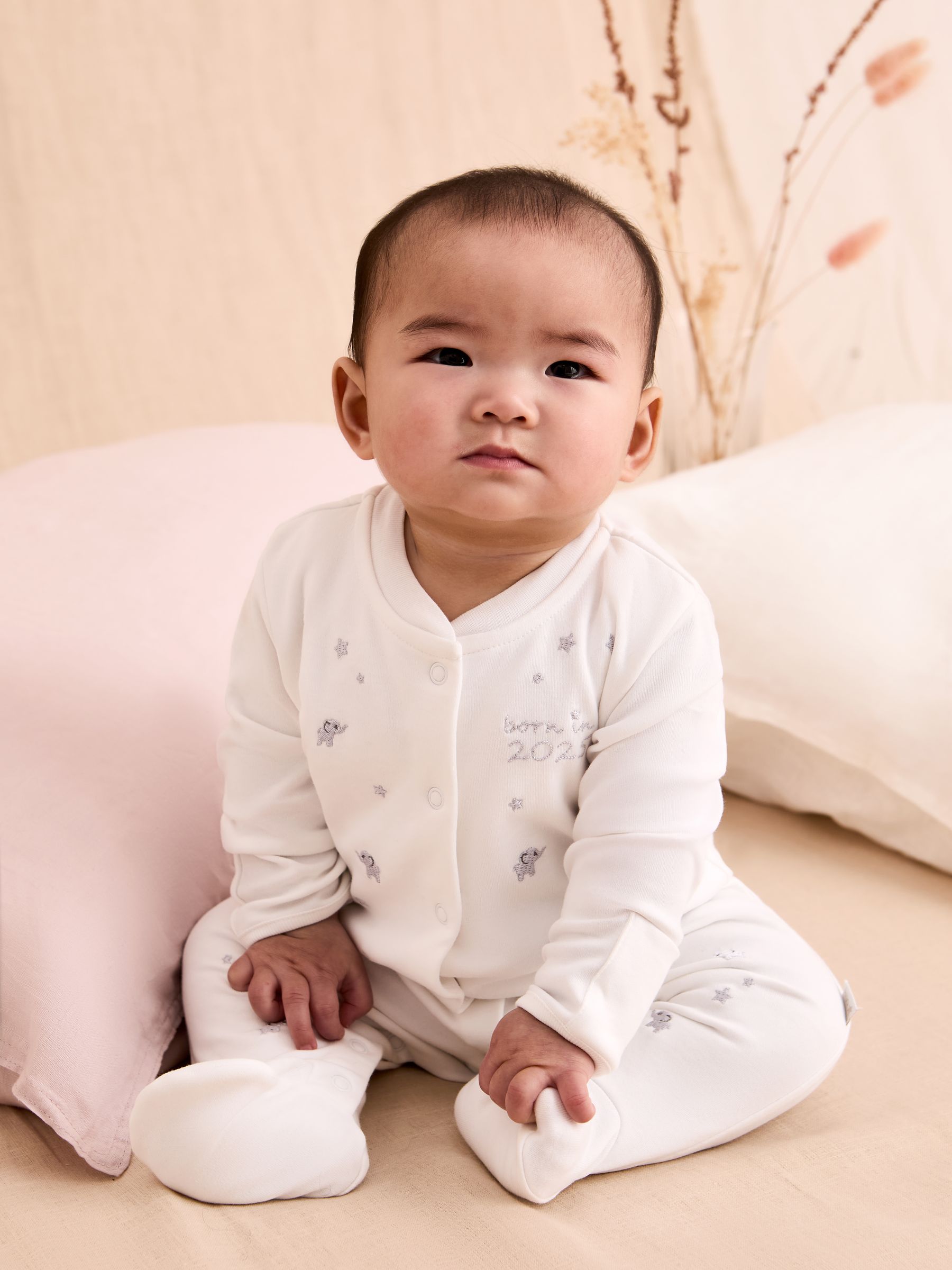 White Born In 2025 Embroidered Sleepsuit