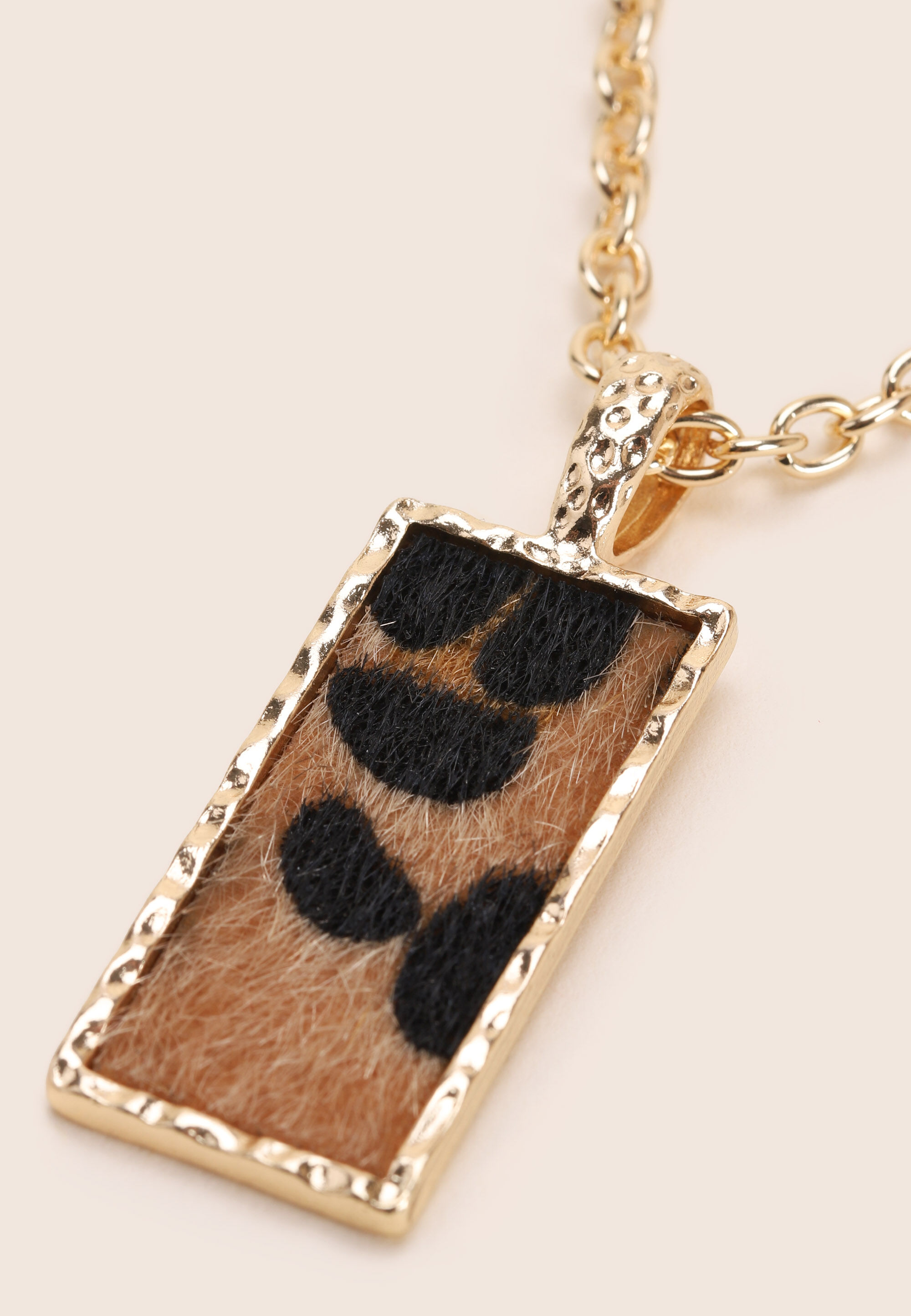 Womens Gold Animal Print Pendant Necklace