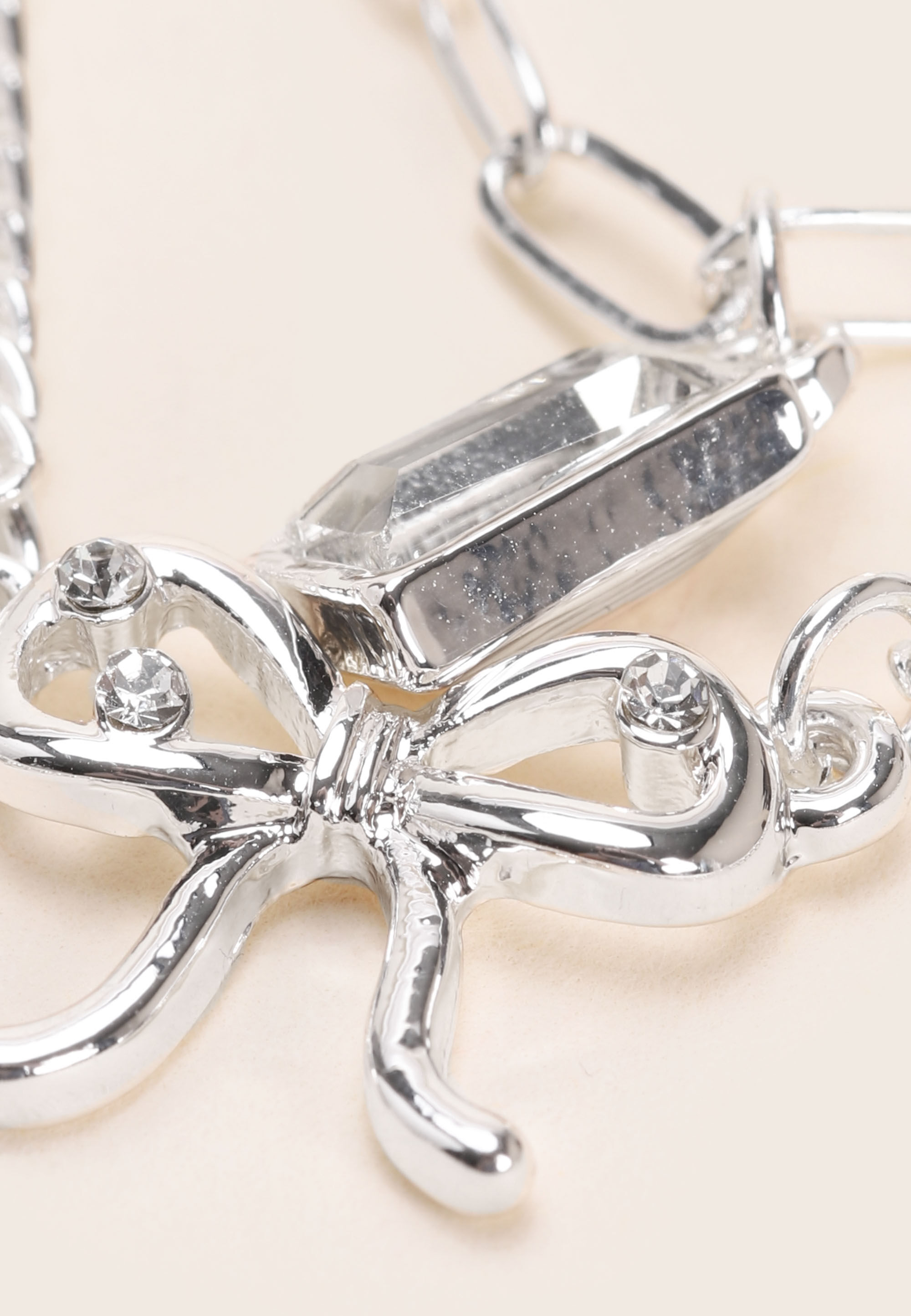 Womens Silver 3 Row Bow Drop Diamante Necklace