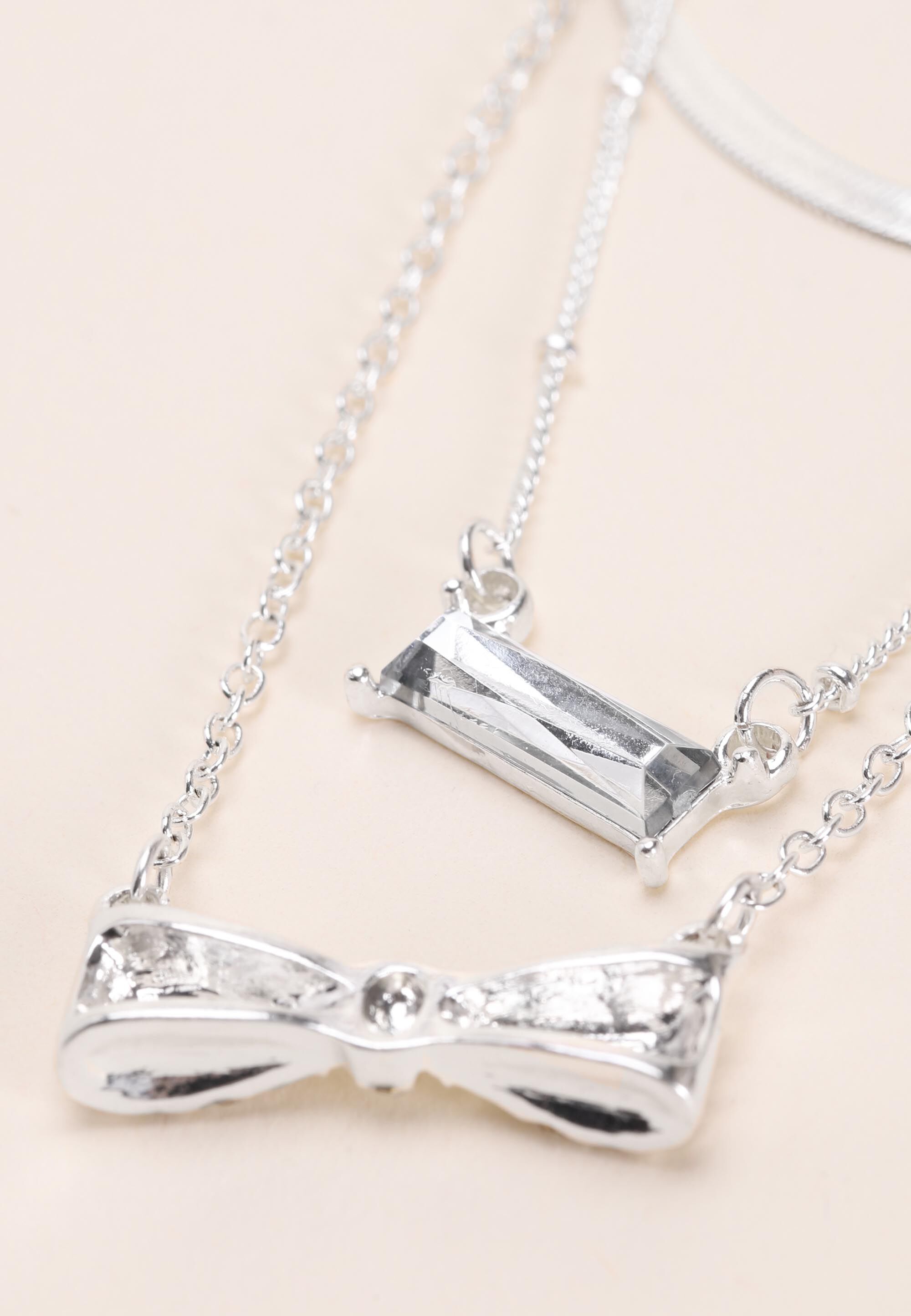 Womens Silver 3 Row Diamante Bow Pendant Necklace