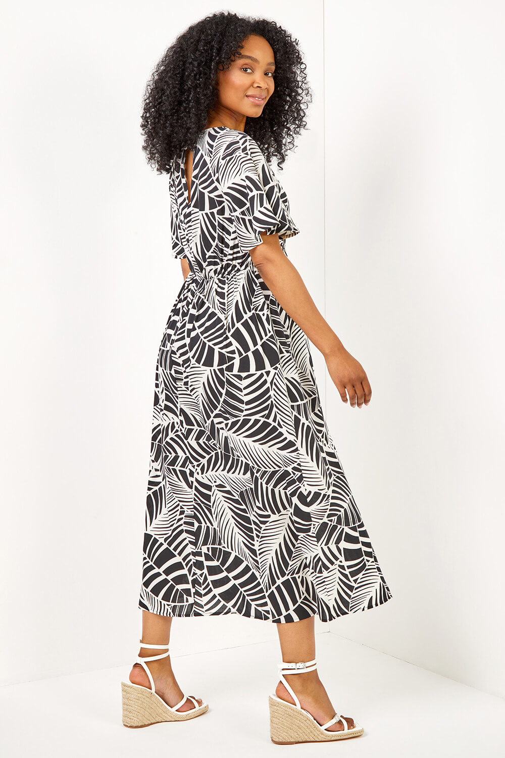 Black Petite Leaf Print Flute Sleeve Dress