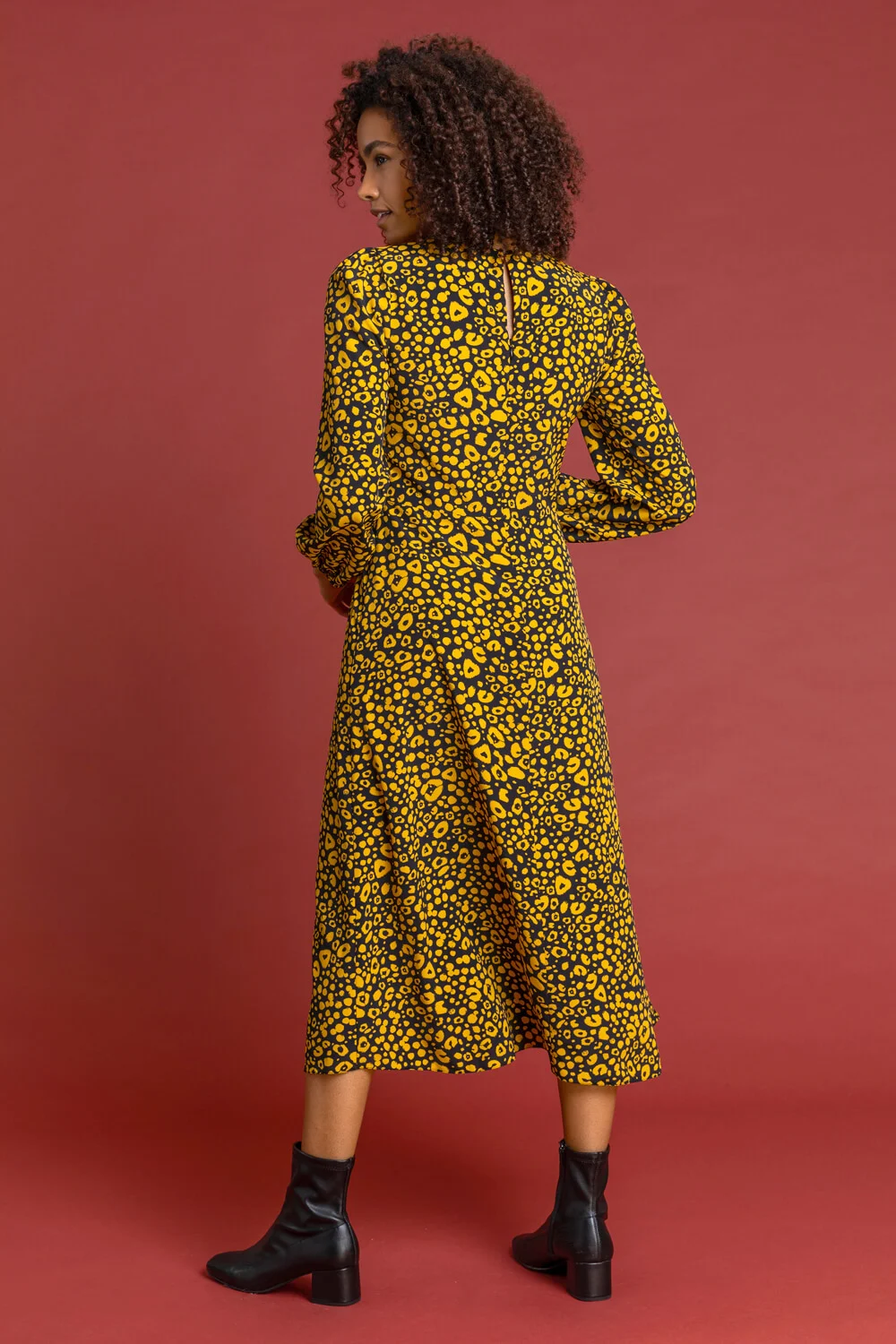 Amber Abstract Animal Print Midi Dress